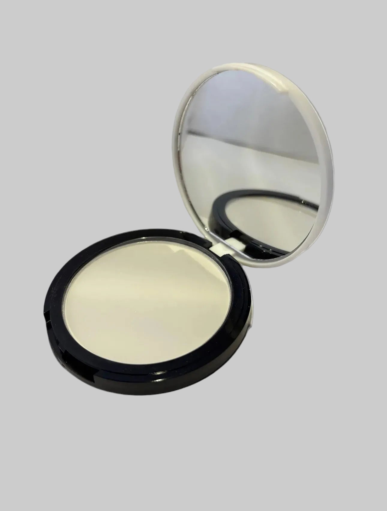 Poudre matifiante avec miroir